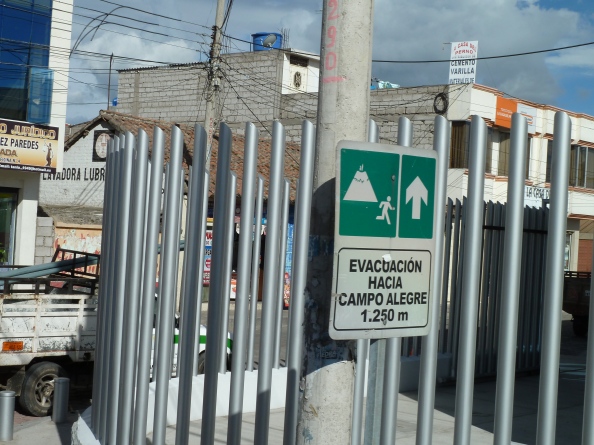 Volcano eruption evacuation route sign south of Quito